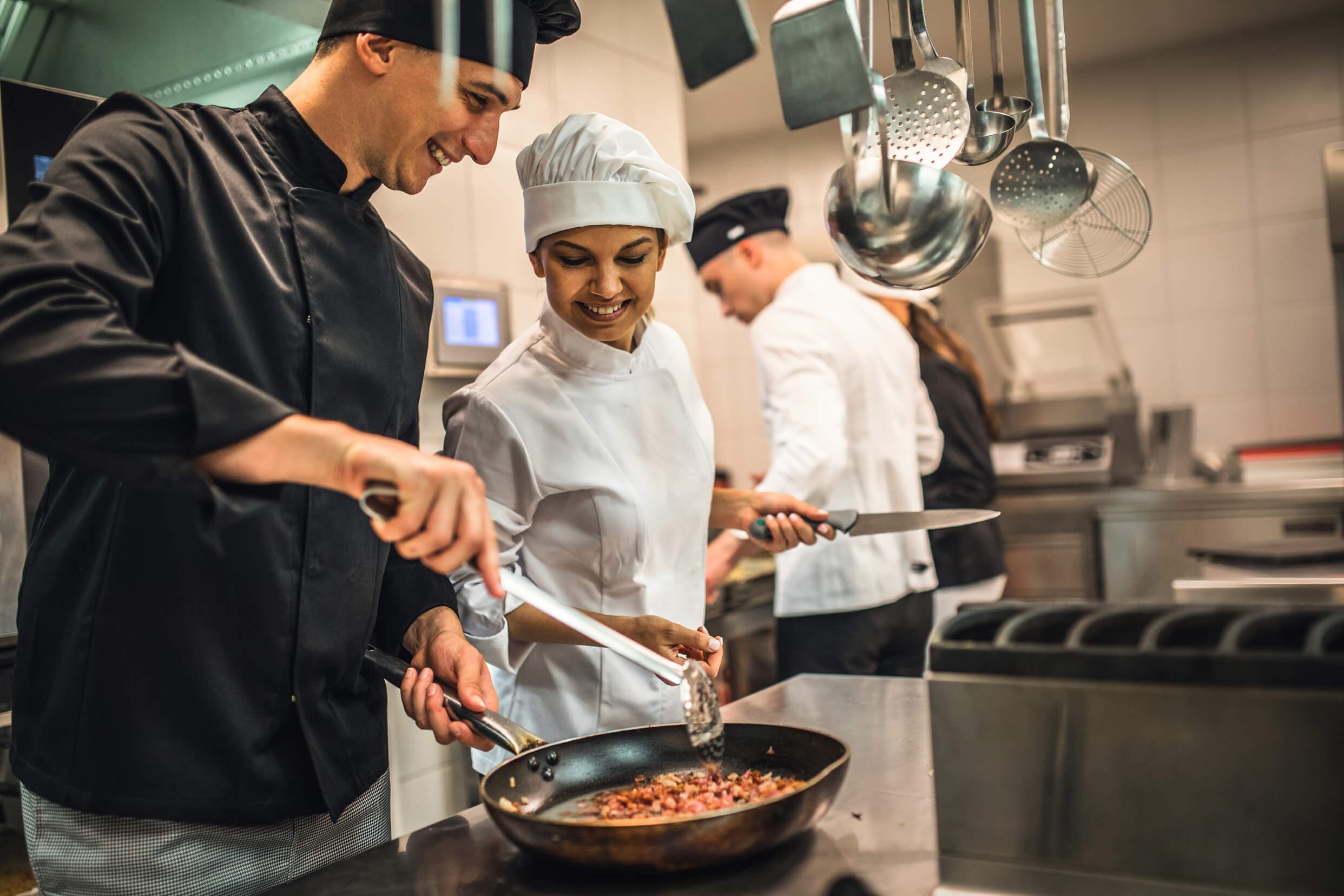Restaurant workers cooking